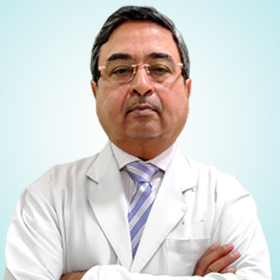 Dr. Vikas Gupta in lab coat
